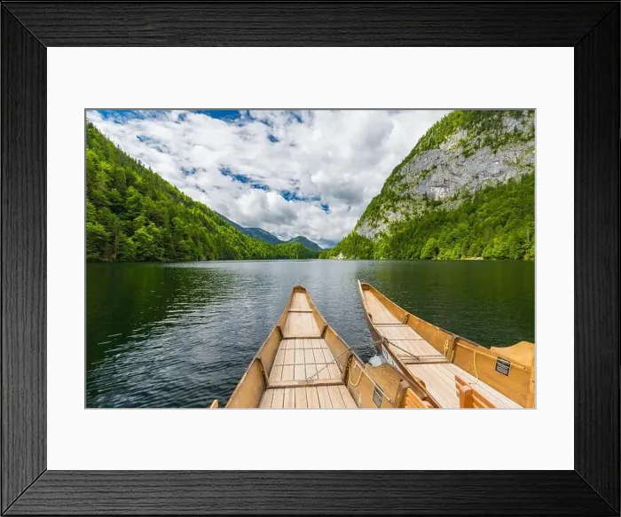 Framed Print : Beautiful view of traditional wooden rowing boat on scenic. Summer mountain lake pass scenic morning light at sunrise clouds over blue sky green trees