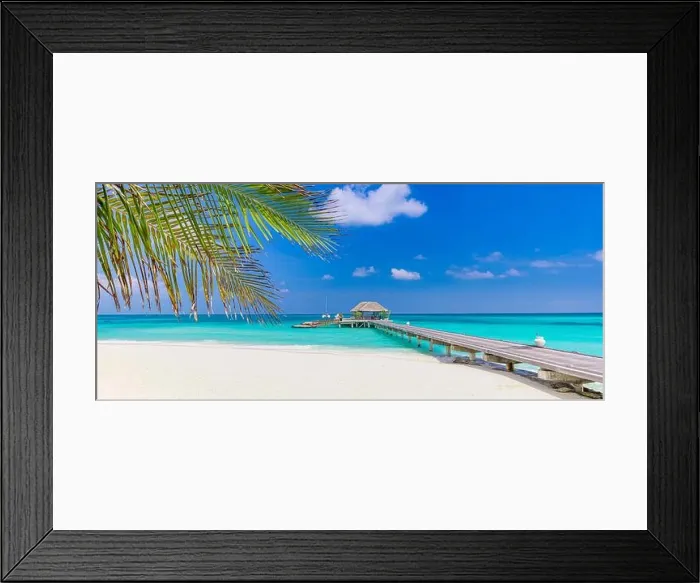 Framed Print : Overwater bungalow, shore coast landscape. Tropical island beach, amazing blue sky endless sea view with palm tree leaves, horizon, exotic luxury Framed Print : Overwater bungalow, shore coast landscape. Tropical island beach, amazing blue sky endless sea view with palm tree leaves, horizon, exotic luxury