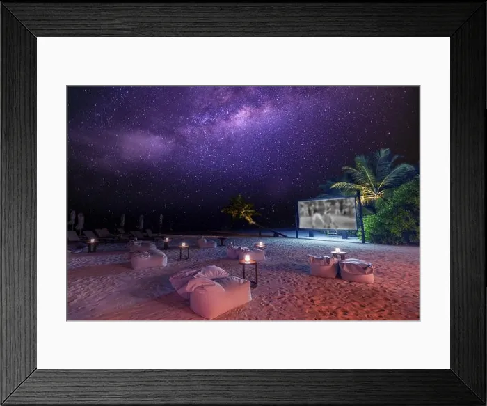 Framed Print : Movie night on starry tropical island beach. Amazingly calm and relaxed scenic view of outdoor cinema with the Milky Way and palm trees soft candles Framed Print : Movie night on starry tropical island beach. Amazingly calm and relaxed scenic view of outdoor cinema with the Milky Way and palm trees soft candles