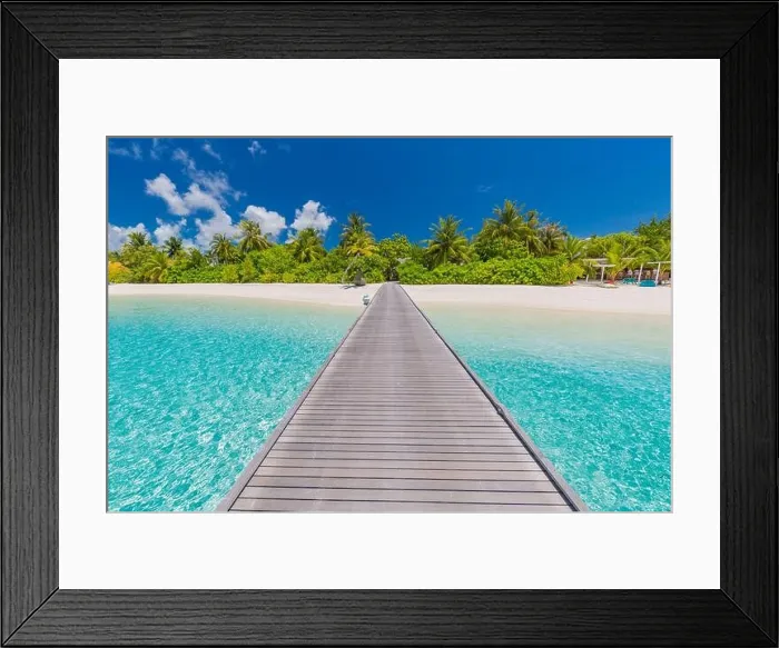 Framed Print : Amazing beach scene, long jetty into the palm trees. Maldives, paradise beach background, design banner. Blue sky and clouds view with calm sea beach Framed Print : Amazing beach scene, long jetty into the palm trees. Maldives, paradise beach background, design banner. Blue sky and clouds view with calm sea beach
