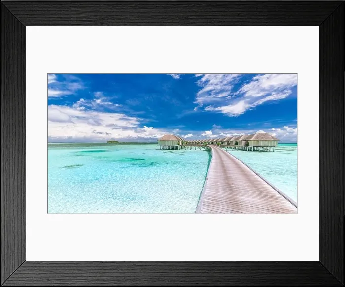 Framed Print : Panoramic landscape of Maldives beach. Tropical panorama, luxury water villa resort with wooden pier or jetty. Luxury travel vacation destination Framed Print : Panoramic landscape of Maldives beach. Tropical panorama, luxury water villa resort with wooden pier or jetty. Luxury travel vacation destination