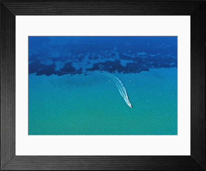 Framed Print : Aerial view of speed boat in motion. Water transportation and summer leisure time activity Framed Print : Aerial view of speed boat in motion. Water transportation and summer leisure time activity