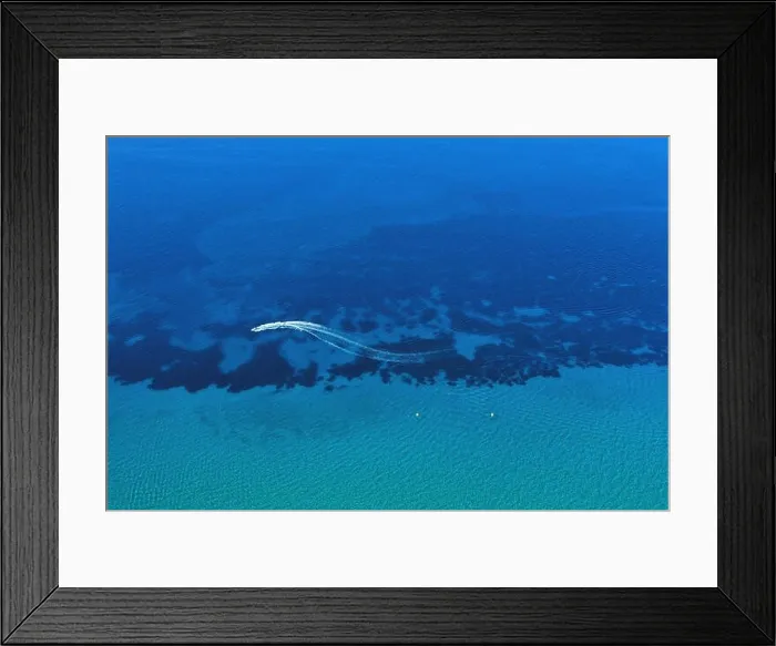 Framed Print : Aerial view of speed boat in motion. Water transportation and summer leisure time activity Framed Print : Aerial view of speed boat in motion. Water transportation and summer leisure time activity