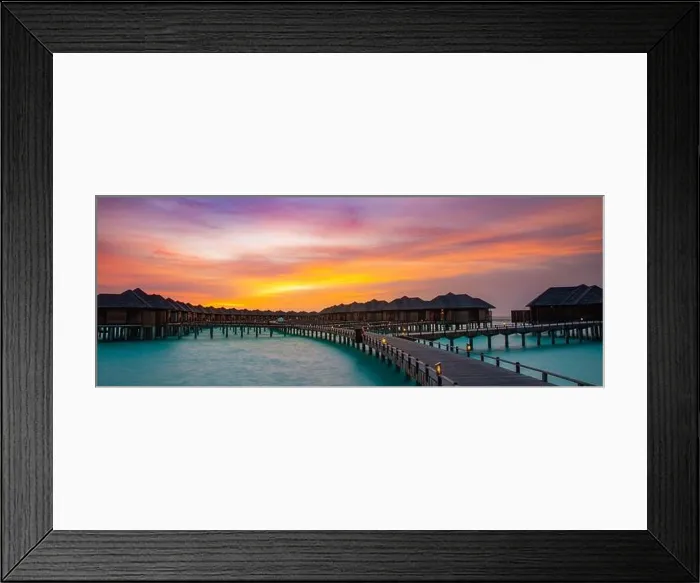 Framed Print : Night time long exposure landscape, over water villas in Maldives. Amazing sunset panorama at Maldives. Luxury resort villas seascape with soft lights Framed Print : Night time long exposure landscape, over water villas in Maldives. Amazing sunset panorama at Maldives. Luxury resort villas seascape with soft lights