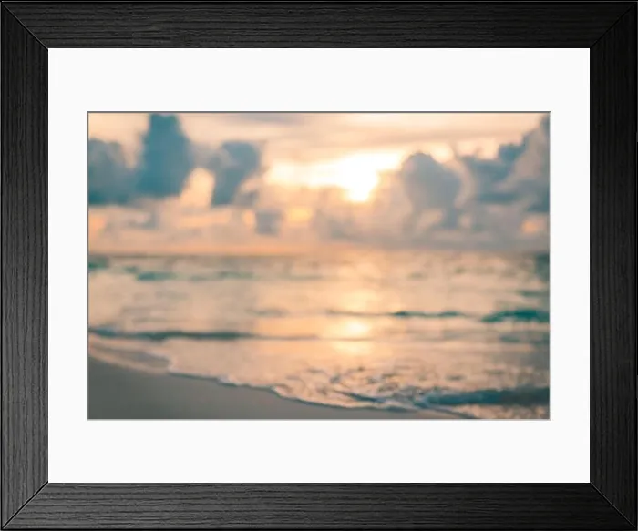 Framed Print : Blur sunset beach with bokeh sun light wave abstract background. Beautiful sea bokeh wave and the light of the sun Framed Print : Blur sunset beach with bokeh sun light wave abstract background. Beautiful sea bokeh wave and the light of the sun