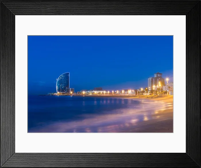 Framed Print : Barcelona Beach in summer night along seaside in Barcelona, Spain. Mediterranean Sea in Spain Framed Print : Barcelona Beach in summer night along seaside in Barcelona, Spain. Mediterranean Sea in Spain