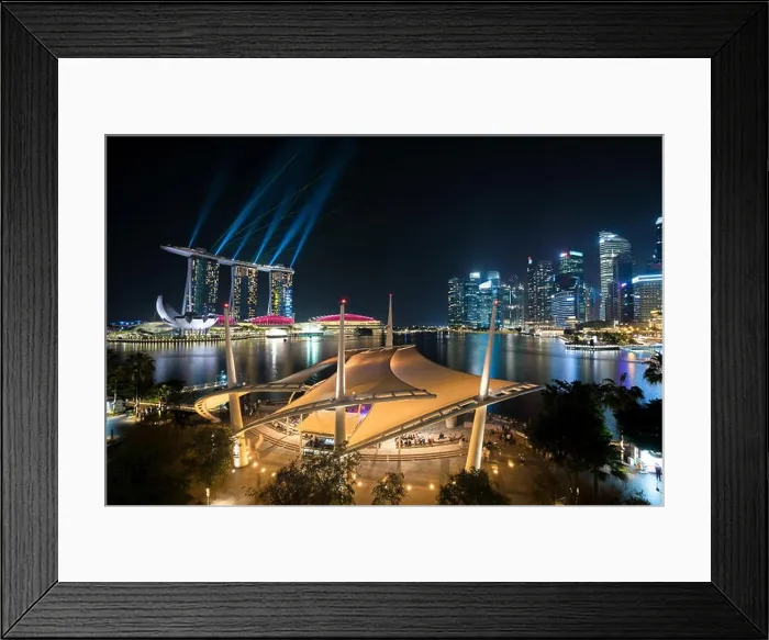 Framed Print : Colorful Singapore skyscraper building and laser show in night at Singapore Framed Print : Colorful Singapore skyscraper building and laser show in night at Singapore