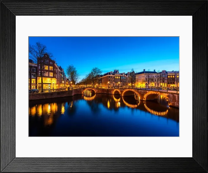 Framed Print : Canals of Amsterdam at night. Amsterdam is the capital and most populous city of the Netherlands Framed Print : Canals of Amsterdam at night. Amsterdam is the capital and most populous city of the Netherlands