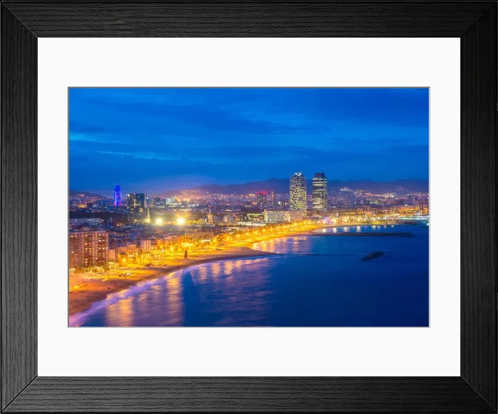 Framed Print : Aerial view of Barcelona Beach in summer night along seaside in Barcelona, Spain. Mediterranean Sea in Spain Framed Print : Aerial view of Barcelona Beach in summer night along seaside in Barcelona, Spain. Mediterranean Sea in Spain