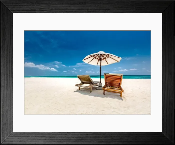 Framed Print : Perfect tropical beach landscape, white sand over blue sea and blue sky. Idyllic and exotic summer vacation landscape. Beach holiday, chairs, umbrella Framed Print : Perfect tropical beach landscape, white sand over blue sea and blue sky. Idyllic and exotic summer vacation landscape. Beach holiday, chairs, umbrella