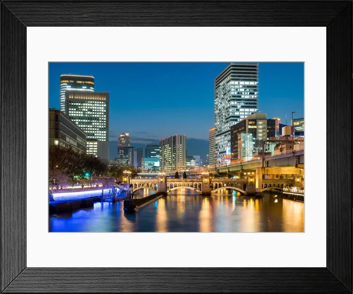 Framed Print : Osaka skyscraper building in Nakanoshima district at night in Osaka, Japan Framed Print : Osaka skyscraper building in Nakanoshima district at night in Osaka, Japan
