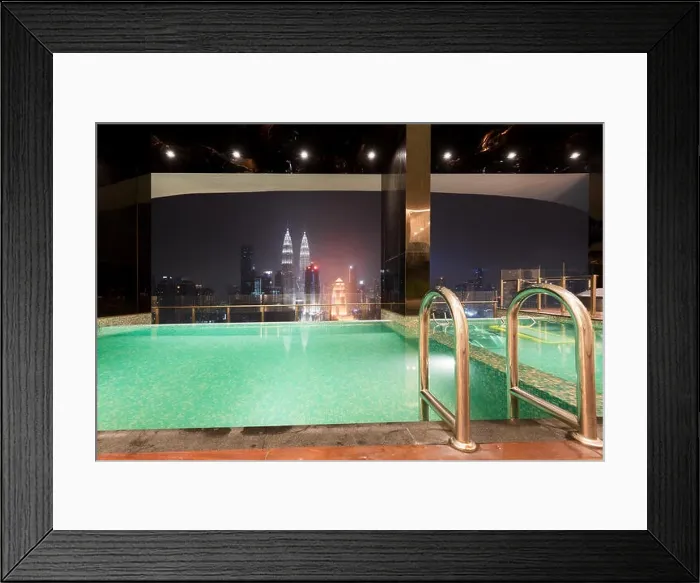 Framed Print : Swimming pool on roof top with beautiful city view Kuala lumpur, Malaysia Framed Print : Swimming pool on roof top with beautiful city view Kuala lumpur, Malaysia