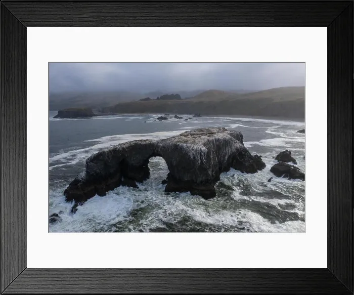 Framed Print : The cold, nutrient-rich waters of the Pacific Ocean wash a natural arch set off the rugged yet scenic coastline of Northern California Framed Print : The cold, nutrient-rich waters of the Pacific Ocean wash a natural arch set off the rugged yet scenic coastline of Northern California