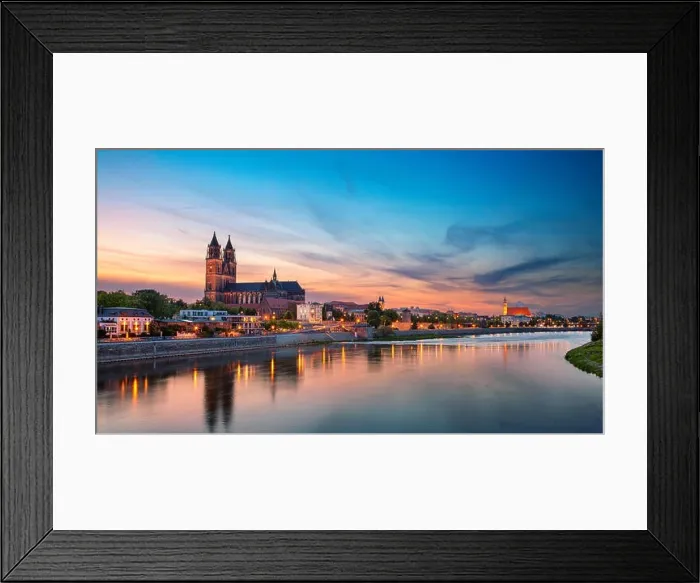 Framed Print : Magdeburg, Germany. Panoramic cityscape image of Magdeburg, Germany with reflection of the city in the Elbe river, during sunset Framed Print : Magdeburg, Germany. Panoramic cityscape image of Magdeburg, Germany with reflection of the city in the Elbe river, during sunset