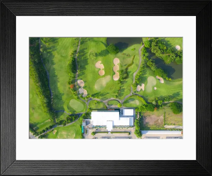 Framed Print : Aerial panoramic view of golf course and houses in city Framed Print : Aerial panoramic view of golf course and houses in city