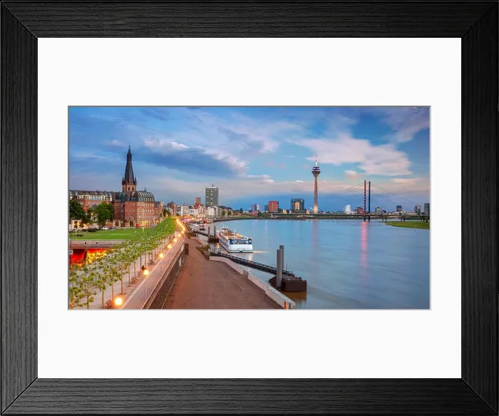 Framed Print : Dusseldorf, Germany. Panoramic cityscape image of riverside Düsseldorf, Germany with Rhine river during sunset Framed Print : Dusseldorf, Germany. Panoramic cityscape image of riverside Düsseldorf, Germany with Rhine river during sunset