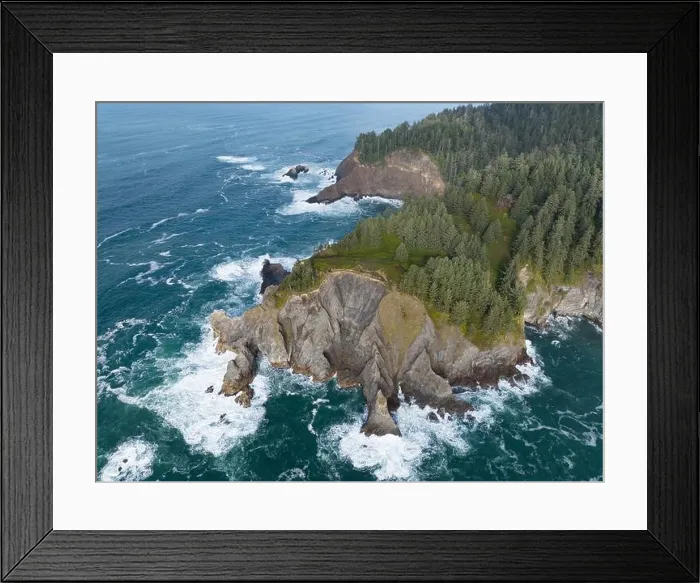Framed Print : The cold Pacific Ocean washes against the rugged coastline of northern Oregon. This Pacific Northwest is known for its spectacular outdoor scenery Framed Print : The cold Pacific Ocean washes against the rugged coastline of northern Oregon. This Pacific Northwest is known for its spectacular outdoor scenery