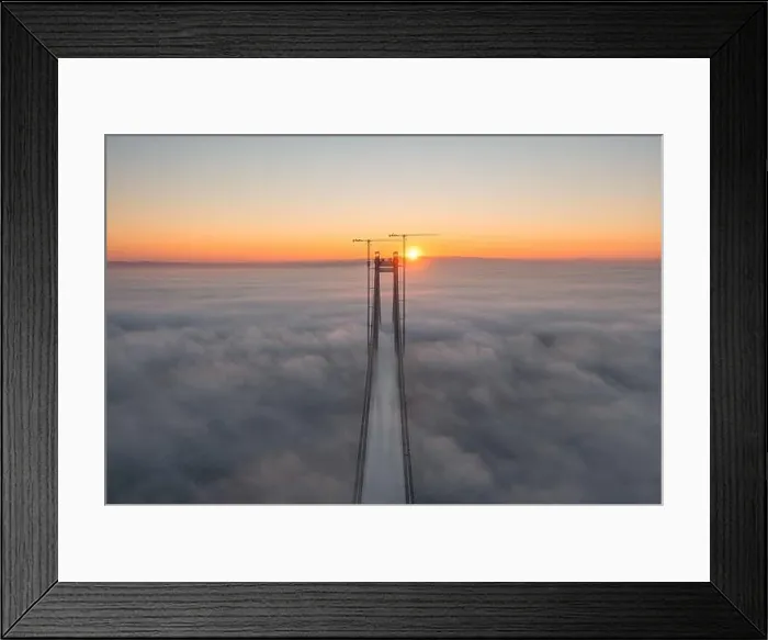 Framed Print : Panoramic aerial drone view from above of the suspended bridge over danube river, under construction, between Braila and Tulcea cities in Romania Framed Print : Panoramic aerial drone view from above of the suspended bridge over danube river, under construction, between Braila and Tulcea cities in Romania