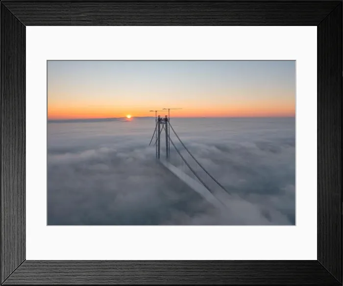 Framed Print : Panoramic aerial drone view from above of the suspended bridge over danube river, under construction, between Braila and Tulcea cities in Romania Framed Print : Panoramic aerial drone view from above of the suspended bridge over danube river, under construction, between Braila and Tulcea cities in Romania