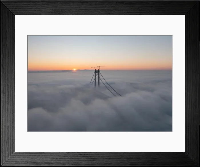 Framed Print : Panoramic aerial drone view from above of the suspended bridge over danube river, under construction, between Braila and Tulcea cities in Romania Framed Print : Panoramic aerial drone view from above of the suspended bridge over danube river, under construction, between Braila and Tulcea cities in Romania