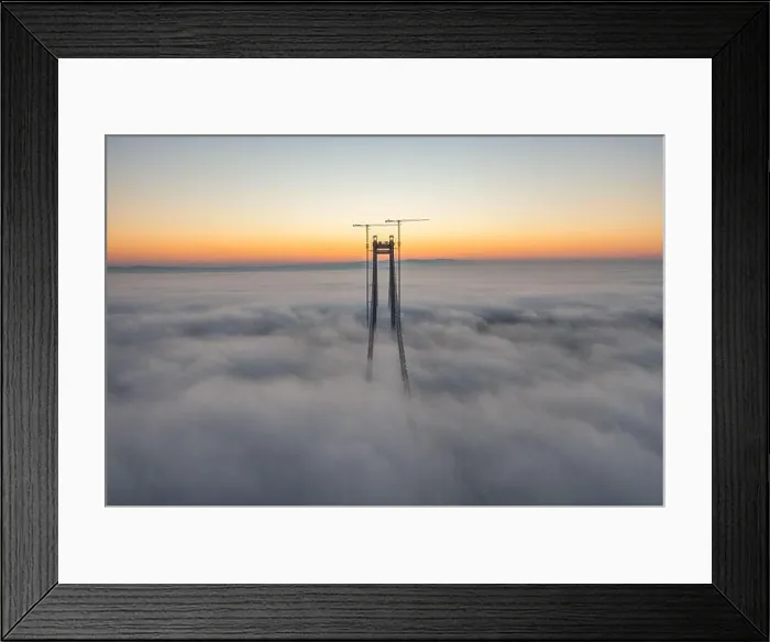Framed Print : Panoramic aerial drone view from above of the suspended bridge over danube river, under construction, between Braila and Tulcea cities in Romania