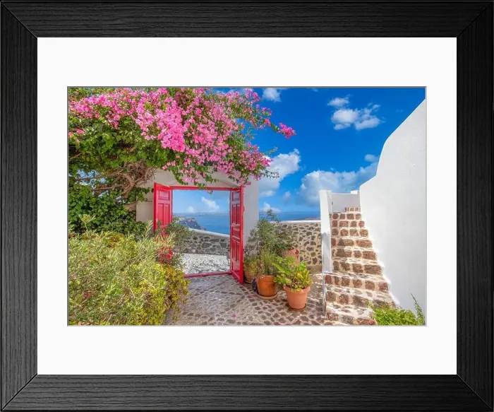Framed Print : Fantastic travel background, Santorini urban landscape. Red door or gate with stairs and white architecture under blue sky. Idyllic summer vacation Framed Print : Fantastic travel background, Santorini urban landscape. Red door or gate with stairs and white architecture under blue sky. Idyllic summer vacation