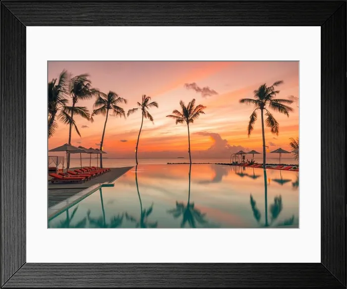 Framed Print : Fantastic poolside, sunset sky, palm trees reflection. Luxury tropical beach landscape, infinity swimming pool, deck chairs bed under umbrellas Framed Print : Fantastic poolside, sunset sky, palm trees reflection. Luxury tropical beach landscape, infinity swimming pool, deck chairs bed under umbrellas