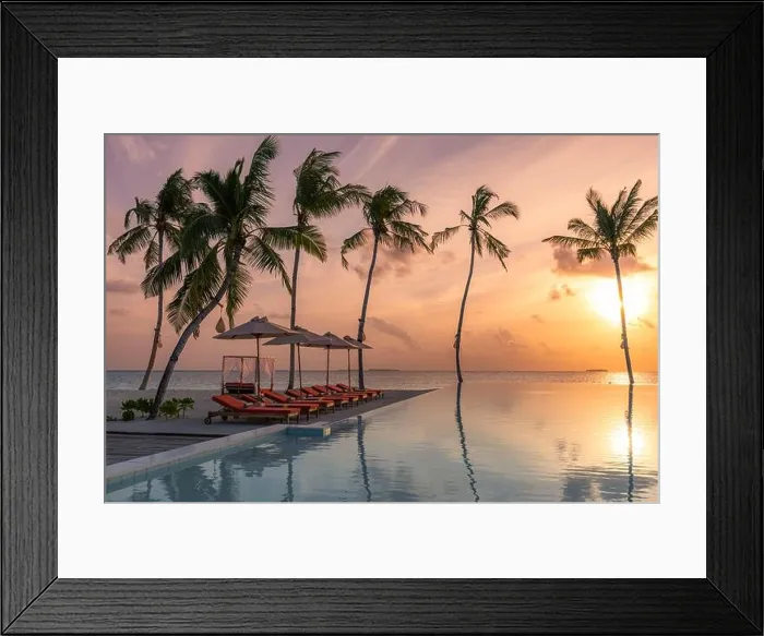 Framed Print : Fantastic poolside, sunset sky, palm trees reflection. Luxury tropical beach landscape, infinity swimming pool, deck chairs bed under umbrellas Framed Print : Fantastic poolside, sunset sky, palm trees reflection. Luxury tropical beach landscape, infinity swimming pool, deck chairs bed under umbrellas