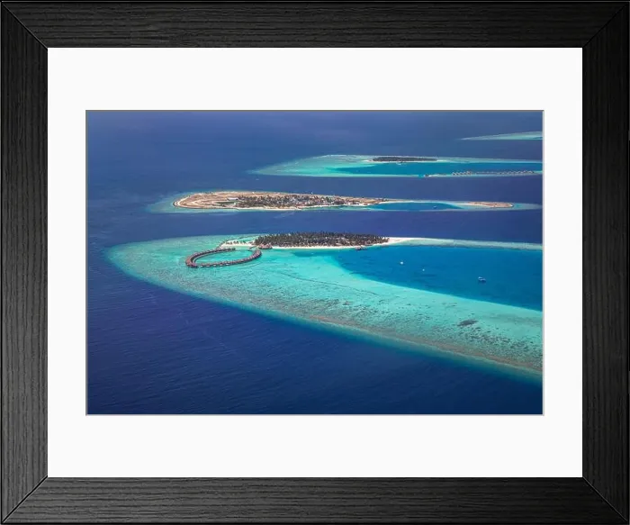 Framed Print : Aerial photo of beautiful Maldives paradise tropical beach. Amazing view, blue turquoise lagoon water, palm trees and white sandy beach. Luxury travel Framed Print : Aerial photo of beautiful Maldives paradise tropical beach. Amazing view, blue turquoise lagoon water, palm trees and white sandy beach. Luxury travel