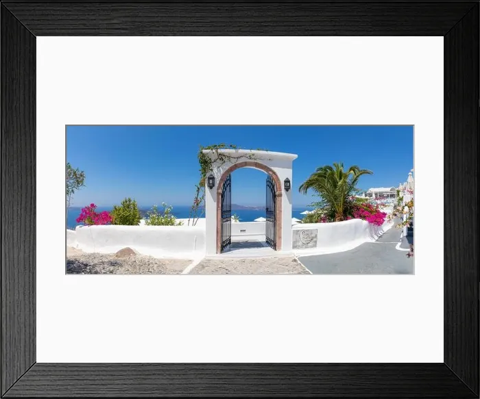 Framed Print : Fantastic travel panorama, Santorini urban street landscape. Door or gate stairs and white architecture under sunny sky. Amazing summer vacation Framed Print : Fantastic travel panorama, Santorini urban street landscape. Door or gate stairs and white architecture under sunny sky. Amazing summer vacation