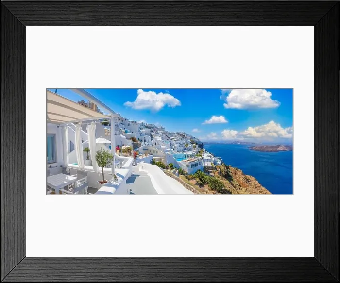 Framed Print : Amazing cityscape view of Santorini island, Oia village. Picturesque famous Greek resort Greece, Europe. Traveling concept background. Summer vacation Framed Print : Amazing cityscape view of Santorini island, Oia village. Picturesque famous Greek resort Greece, Europe. Traveling concept background. Summer vacation
