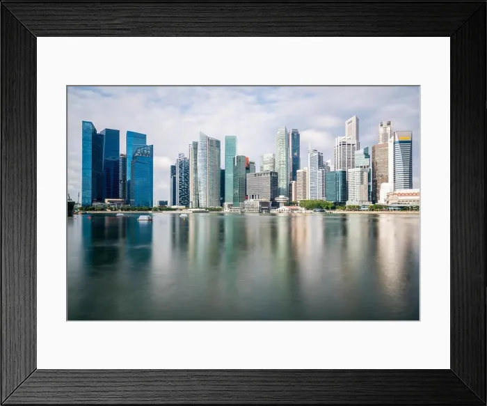 Framed Print : Singapore business district with skyscraper building and reflection at Marina Bay, Singapore Framed Print : Singapore business district with skyscraper building and reflection at Marina Bay, Singapore