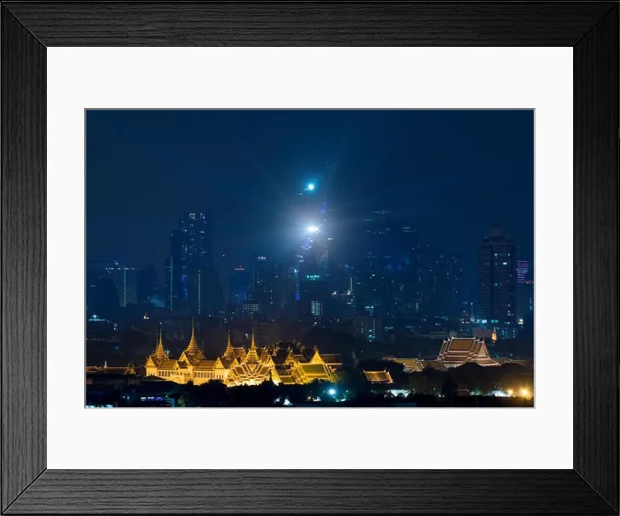 Framed Print : Grand palace bangkok with bangkok city skyscrapers at night in Bangkok, Thailand Framed Print : Grand palace bangkok with bangkok city skyscrapers at night in Bangkok, Thailand