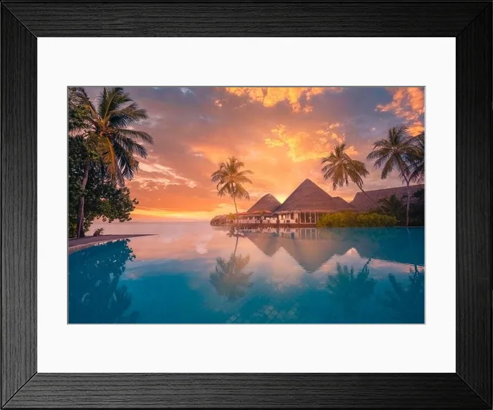 Framed Print : Sunset tourism landscape. Luxurious beach resort with swimming pool reflection beach with palm trees, sunset sky sun rays. Amazing travel background Framed Print : Sunset tourism landscape. Luxurious beach resort with swimming pool reflection beach with palm trees, sunset sky sun rays. Amazing travel background