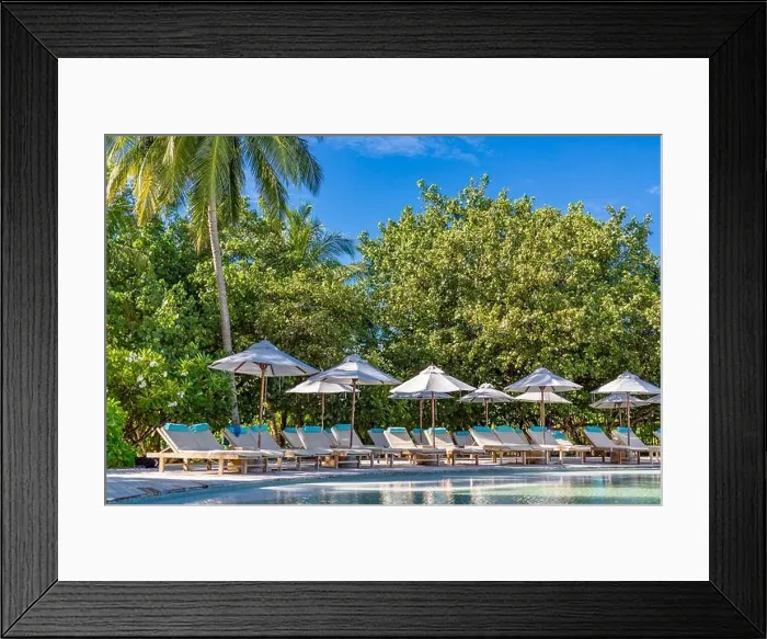 Framed Print : Beautiful swimming pool with loungers, chairs under umbrella. Luxury tropical swimming pool, palm trees on tropical nature pattern Framed Print : Beautiful swimming pool with loungers, chairs under umbrella. Luxury tropical swimming pool, palm trees on tropical nature pattern
