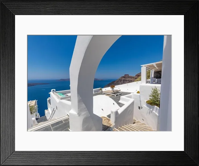 Framed Print : White wash staircases and entrance on Santorini Island, Greece. The view toward Caldera sea view. Famous tourism attraction, travel destination Framed Print : White wash staircases and entrance on Santorini Island, Greece. The view toward Caldera sea view. Famous tourism attraction, travel destination