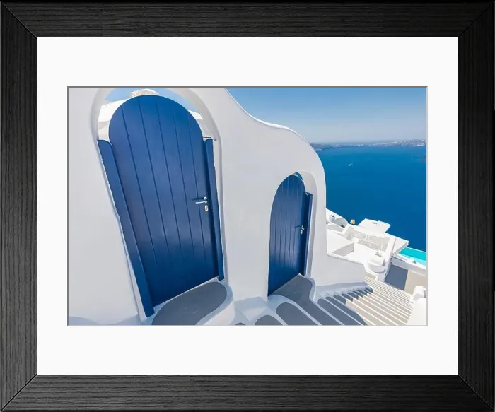 Framed Print : Beautiful travel background for vacation holiday banner. White houses in the town of Oia on the island of Santorini, panorama. Amazing scenic views
