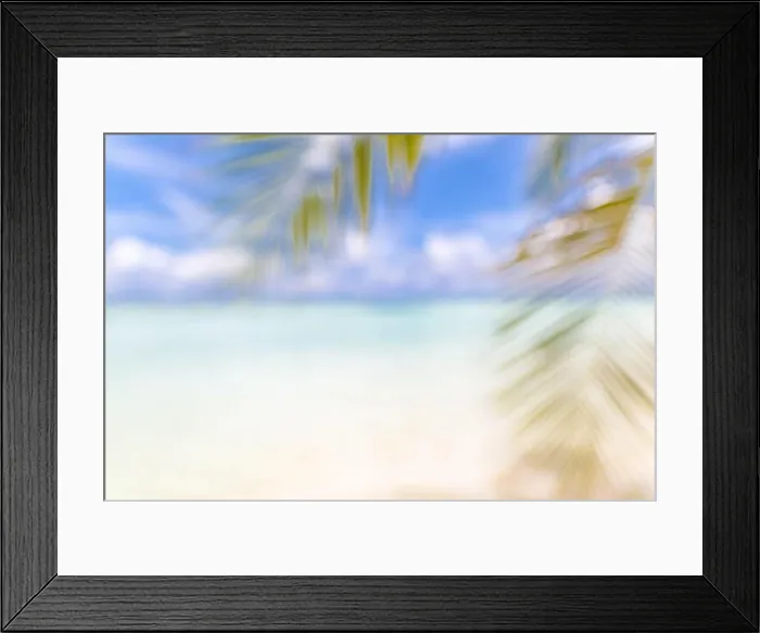 Framed Print : Blurred beach with palm leaf over white sand. Tropical nature pattern, bokeh sea view as exotic landscape, summer scene with copy space Framed Print : Blurred beach with palm leaf over white sand. Tropical nature pattern, bokeh sea view as exotic landscape, summer scene with copy space