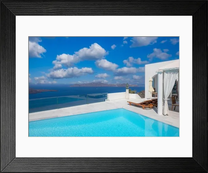 Framed Print : Travel vacation holiday banner. White houses, caldera, pool swimming in the town of Oia on the island of Santorini, panorama. Amazing scenic, luxury Framed Print : Travel vacation holiday banner. White houses, caldera, pool swimming in the town of Oia on the island of Santorini, panorama. Amazing scenic, luxury