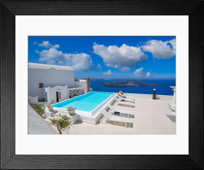 Framed Print : Travel vacation holiday banner. White houses, caldera, pool swimming in the town of Oia on the island of Santorini, panorama. Amazing scenic, luxury Framed Print : Travel vacation holiday banner. White houses, caldera, pool swimming in the town of Oia on the island of Santorini, panorama. Amazing scenic, luxury