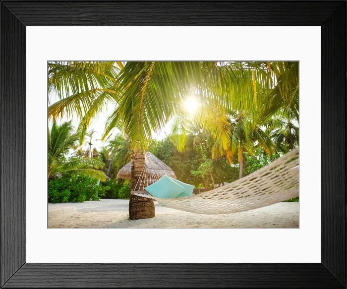 Framed Print : Ultimate relaxation, hanging hammock on palm tree with soft sun rays under palm leaves. Tropical island nature, paradise traveling destination, summer Framed Print : Ultimate relaxation, hanging hammock on palm tree with soft sun rays under palm leaves. Tropical island nature, paradise traveling destination, summer