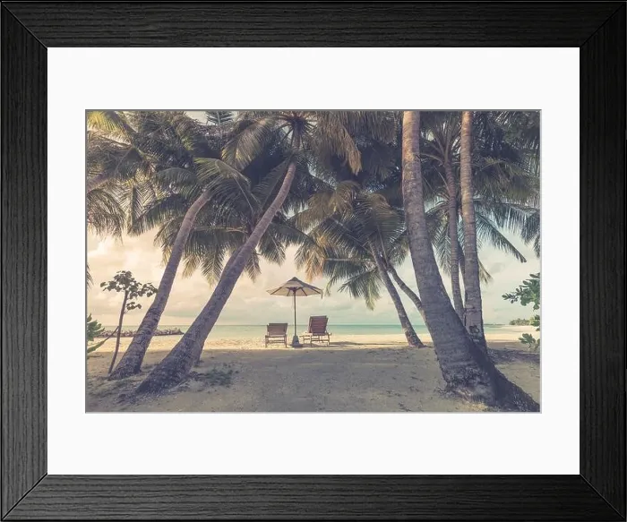 Framed Print : Beautiful tropical sunset scenery, two sun beds, loungers, umbrella under palm tree. Beach white sand, sea view with horizon, colorful twilight sky Framed Print : Beautiful tropical sunset scenery, two sun beds, loungers, umbrella under palm tree. Beach white sand, sea view with horizon, colorful twilight sky