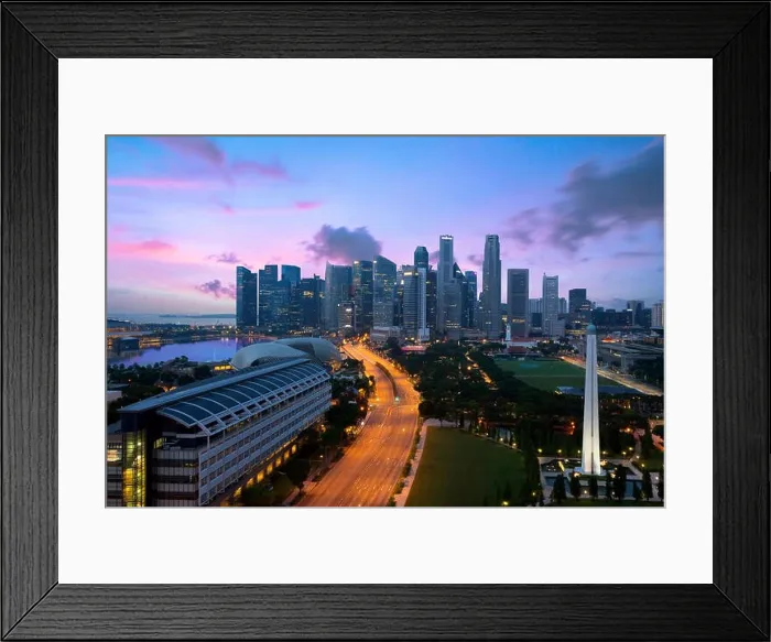 Framed Print : Panorama of Singapore business district skyline and Singapore skyscraper with War Memorial Park in night at Marina Bay, Singapore Framed Print : Panorama of Singapore business district skyline and Singapore skyscraper with War Memorial Park in night at Marina Bay, Singapore