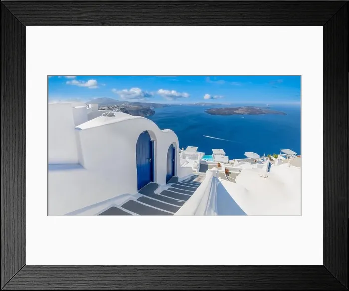 Framed Print : Beautiful travel background for vacation holiday banner. White houses in the town of Oia on the island of Santorini, panorama. Amazing scenic views Framed Print : Beautiful travel background for vacation holiday banner. White houses in the town of Oia on the island of Santorini, panorama. Amazing scenic views
