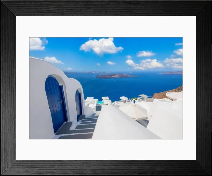 Framed Print : Beautiful travel background for vacation holiday banner. White houses in the town of Oia on the island of Santorini, panorama. Amazing scenic views Framed Print : Beautiful travel background for vacation holiday banner. White houses in the town of Oia on the island of Santorini, panorama. Amazing scenic views