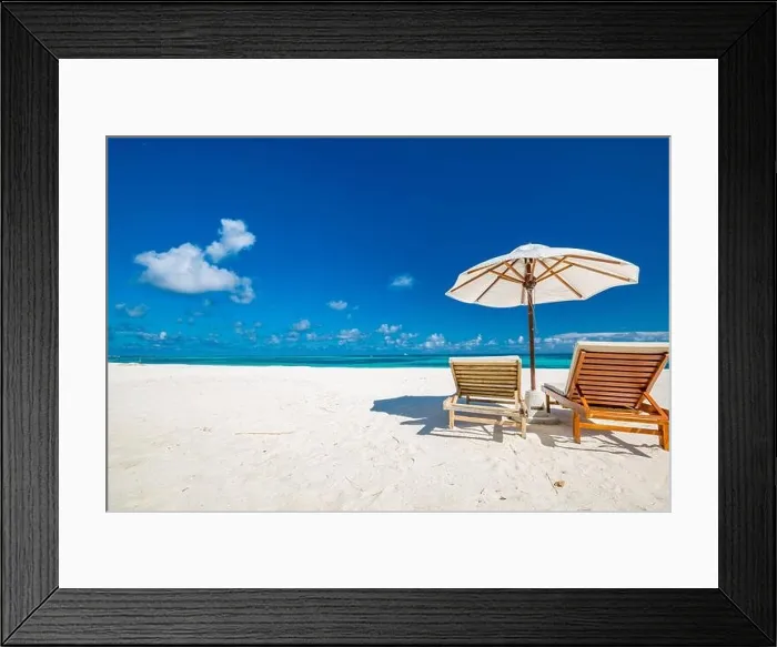 Framed Print : Beautiful tropical beach, two sun beds, loungers, umbrella under palm tree. White sand, sea view horizon, blue sky, calmness and relax resort scenery Framed Print : Beautiful tropical beach, two sun beds, loungers, umbrella under palm tree. White sand, sea view horizon, blue sky, calmness and relax resort scenery