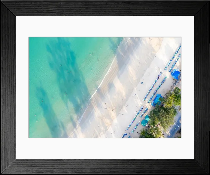 Framed Print : Aerial view of people swimming on the pink swim ring in the transparent turquoise sea in Phuket, Thailand Framed Print : Aerial view of people swimming on the pink swim ring in the transparent turquoise sea in Phuket, Thailand