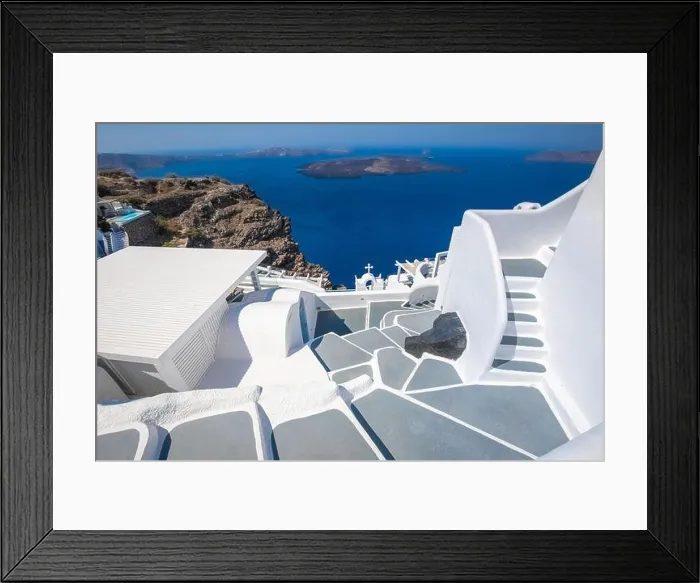 Framed Print : Greek island of Santorini. Amazing travel panorama, white houses, stairs and flowers on the streets. Idyllic summer vacation, urban landscape, tourism Framed Print : Greek island of Santorini. Amazing travel panorama, white houses, stairs and flowers on the streets. Idyllic summer vacation, urban landscape, tourism