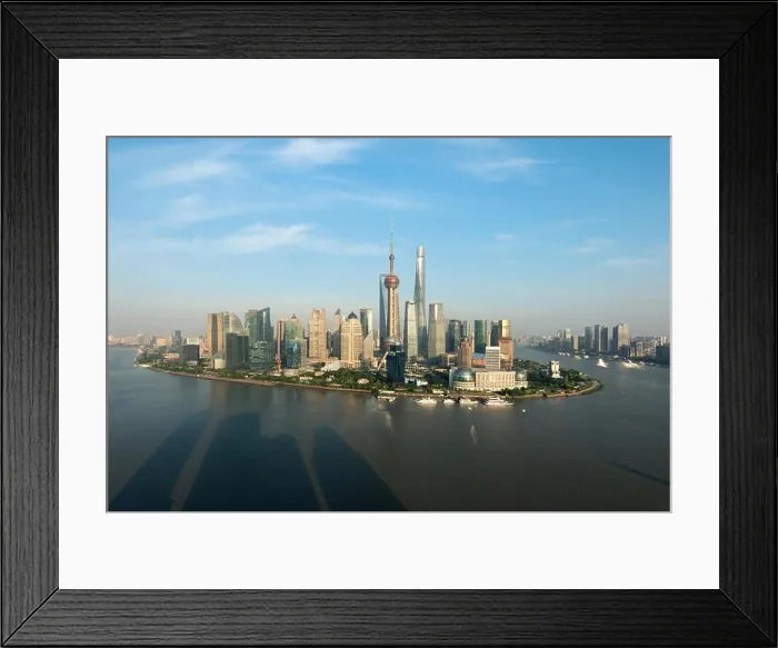 Framed Print : Shanghai skyline panoramic view along Huangpu river at Shanghai Lujiazui Pudong central business center in Shanghai, China Framed Print : Shanghai skyline panoramic view along Huangpu river at Shanghai Lujiazui Pudong central business center in Shanghai, China