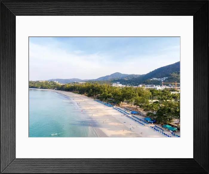 Framed Print : Aerial view of people swimming in the transparent turquoise sea at Karon beach in Phuket, Thailand Framed Print : Aerial view of people swimming in the transparent turquoise sea at Karon beach in Phuket, Thailand